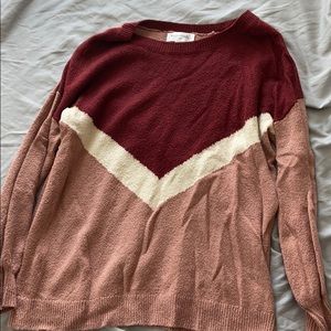 Burgundy and pink maternity sweater.